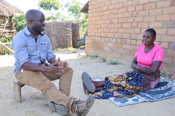 Community Health Program conducting follow-up visit