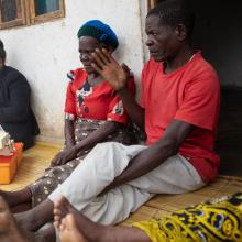 Wife and husband sit together