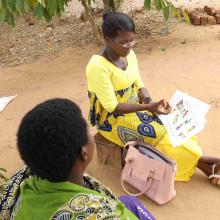 Community Health Worker Mary Brown screens a client